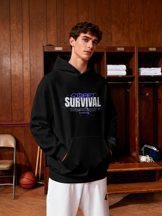 Person wearing a black hoodie with text in a locker room setting